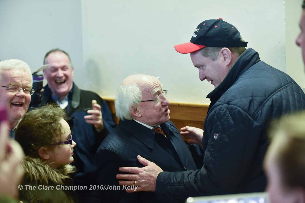 President Michael D Higgins chatting with Peter Gohery of Eyrecourt, the national Council Rep. in the IFA during his visit to Labane to meet the victims of flooding in the area. Photograph by John Kelly.