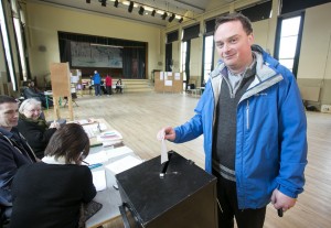 Fr Ger Fitzgerald casting his vote at The Holy Family National School. Photograph by Arthur Ellis.