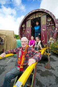 Edward McDonagh with 10-year-olds Diana and Brian McDonagh and eight- year-old Tracey Marie McDonagh at the Traveller site re-enactment. Photograph by Arthur Ellis.