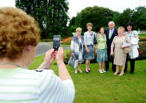 MC Marty Whelan poses for pictures with fans during the garden party. Photograph by John Kelly.