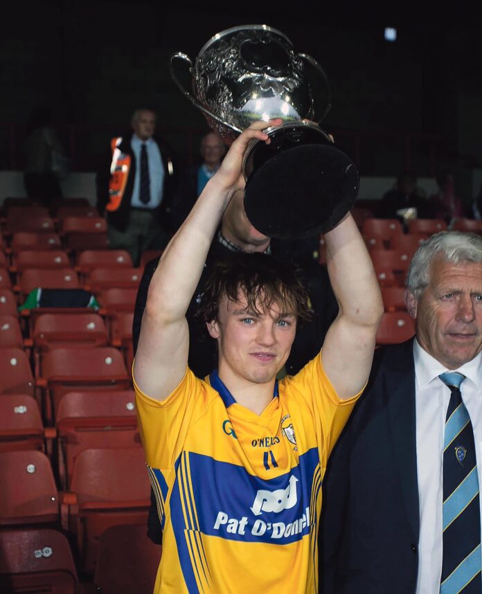 Captain Shane McGrath lifts the cup.