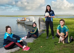 The Harvey sisters; Shauna, Caoimhe, Ciara and Grainne take time out by the Shannon, near their home in Querrin, with pet dog Harley ahead of the big game.Photograph by John Kelly.