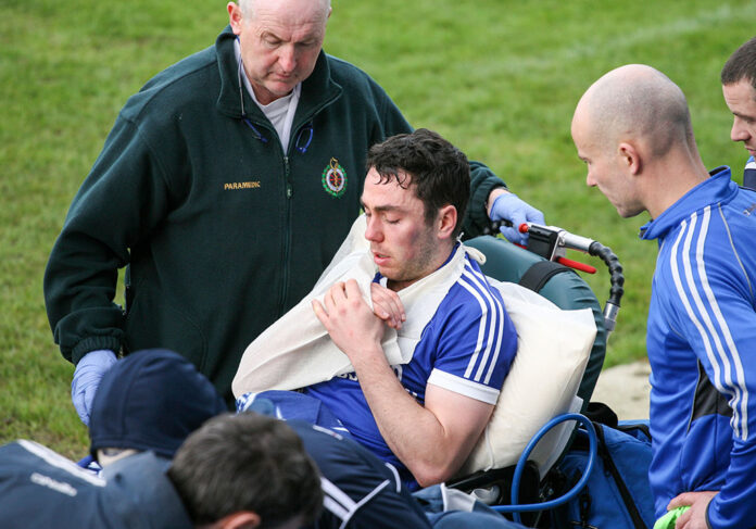 Cratloes dual star Conor McGrath is taken from Cusack Park Ennis by stretcher after his side lost out to Clonlara in the Clare County Championship Hurling semi final today. Pic Arthur Ellis.