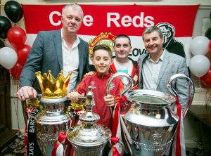 Gary Pallister and Denis Irwin with with Jack (10) and Mikey Dunleavy, Ennis. Photograph by Arthur Ellis.