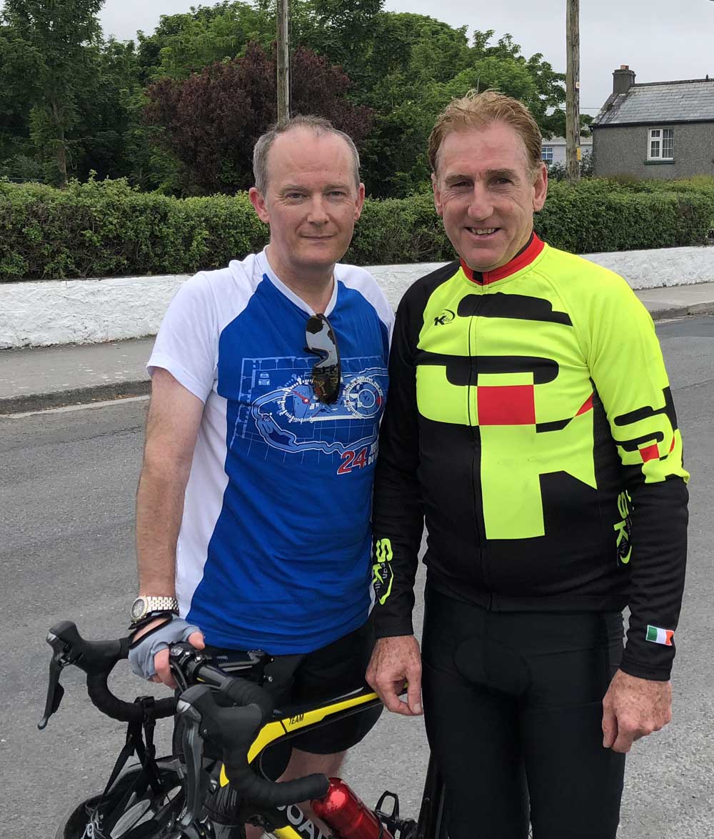 Clare Champion general manager, John Galvin, with Seán Kelly at the finish of the cycle.