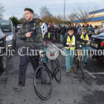 Gaelscoil Mhíchíl Cíosóg walking bus, Gaelscoil Mhíchíl Cíosóg, Ennis, at 09:32:14, 11February 2022,