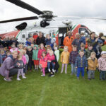 Irish Coast Guard rescue helicopter, Kilmaley National School, , at 10:12:19, 12May 2022,