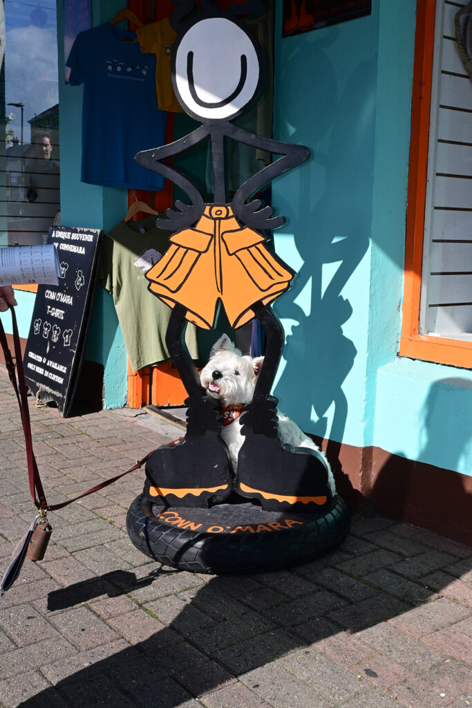 Larking outside Conn O'Mara's shop in Clifden.