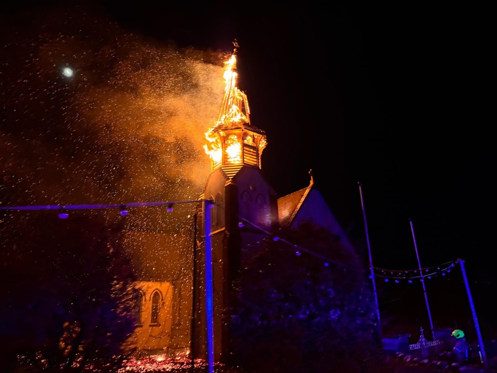 Church spire bursts into flames after being struck by lightning | The ...